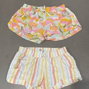 2 pairs Billabong shorts. Worn once. Like new. Size M/8